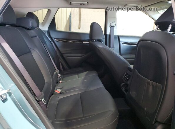 KNDERCAA8R7592899 2024 KIA SELTOS Синий Вид задней части салона