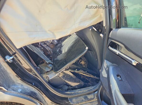 KNDERCAA8S7749787 2025 KIA SELTOS Black Вид задньої частини салону