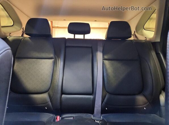 KNDERCAAXM7174322 2021 KIA SELTOS Silver Vista de los asientos traseros