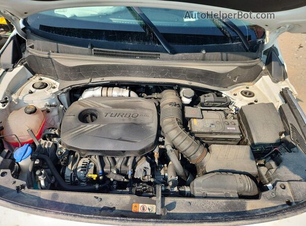 KNDETCA23P7445297 2023 KIA SELTOS White Vista del compartimento del motor