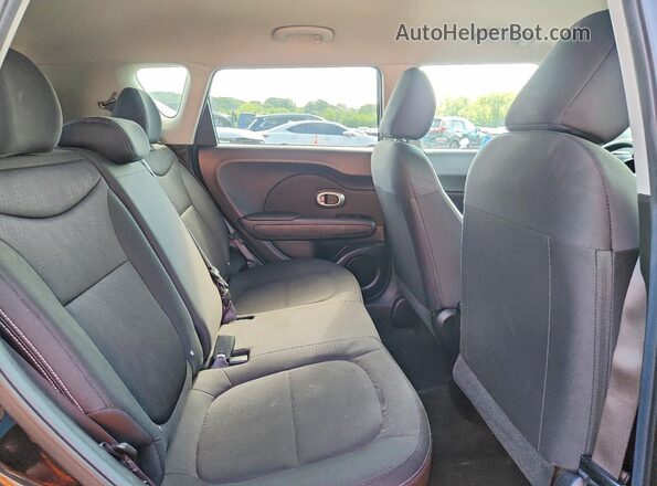 KNDJN2A20G7373526 2016 KIA SOUL Black Rear seats view