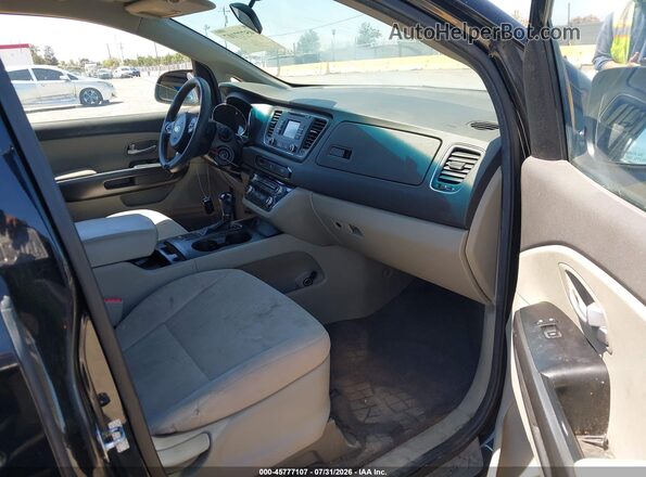 KNDMA5C10G6186677 2016 KIA SEDONA Black Front interior view
