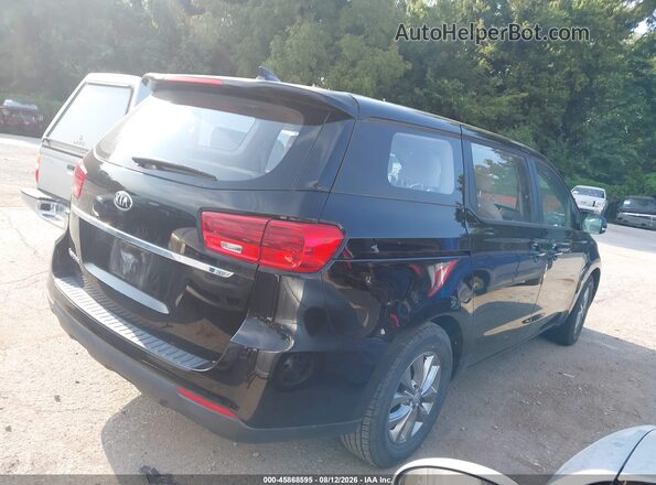 KNDMA5C17K6565362 2019 KIA SEDONA Black Widok wnętrza z tyłu