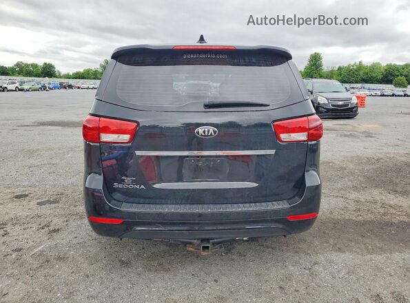 KNDMA5C18G6149974 2016 KIA SEDONA Черный Вид сзади