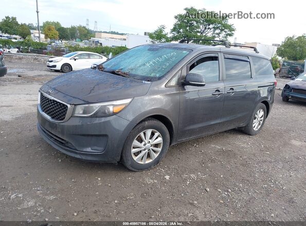 KNDMB5C10G6171917 2016 KIA SEDONA Gray Front left