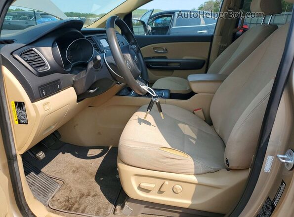 KNDMB5C11G6151868 2016 KIA SEDONA Tan Вид салону спереду