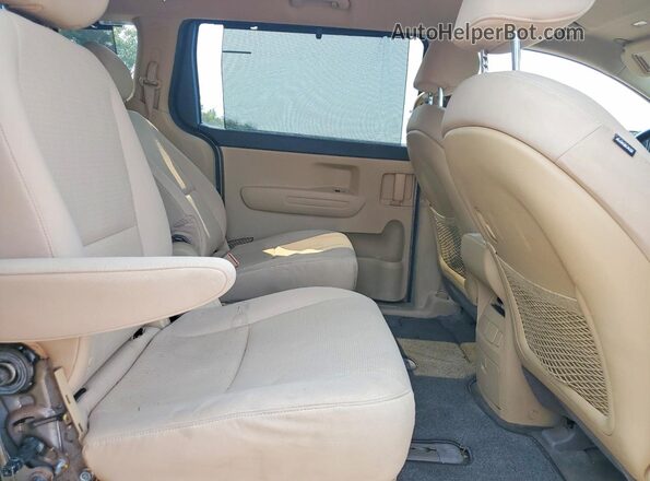 KNDMB5C11G6151868 2016 KIA SEDONA Tan Вид задньої частини салону