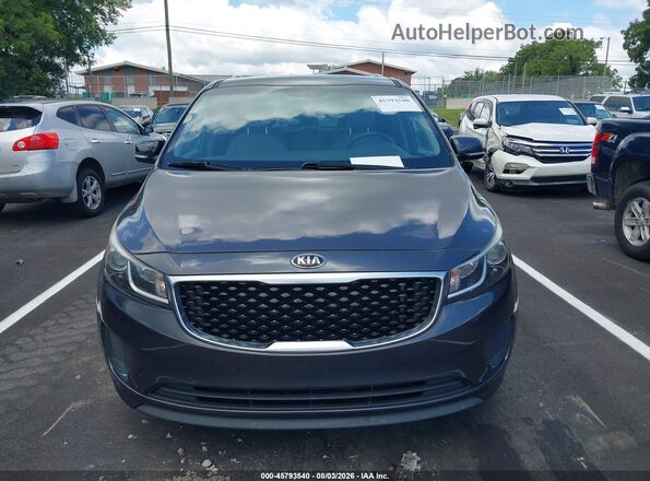 KNDMB5C11G6200938 2016 KIA SEDONA Gray Front view