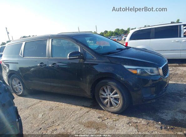KNDMB5C11H6330428 2017 KIA SEDONA Black Вид задньої частини салону