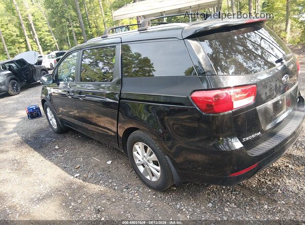 KNDMB5C13G6085985 2016 KIA SEDONA Black Trasero izquierdo
