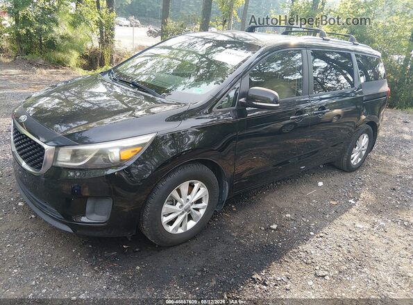 KNDMB5C13G6085985 2016 KIA SEDONA Black Vista tres cuartos delantera izquierda