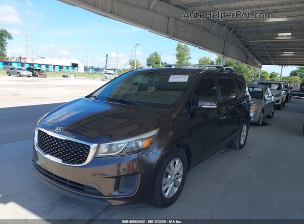 KNDMB5C13H6270314 2017 KIA SEDONA Brown Front view