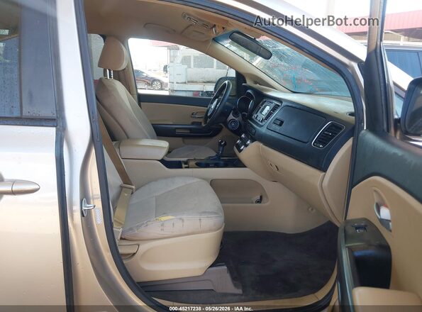 KNDMB5C14H6227987 2017 KIA SEDONA Beige Front interior view