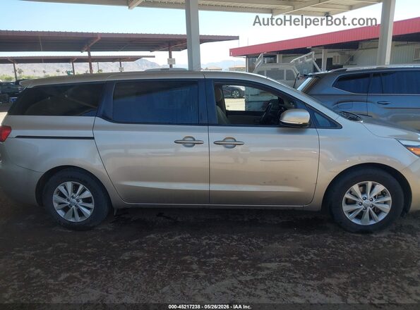 KNDMB5C14H6227987 2017 KIA SEDONA Beige Rear interior view
