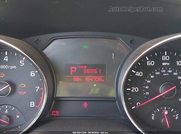 KNDMB5C14H6227987 2017 KIA SEDONA Beige Rear seats view