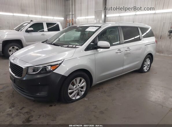 KNDMB5C14H6279720 2017 KIA SEDONA Серебряный Передняя левая четверть