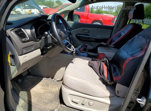 KNDMB5C15G6092095 2016 KIA SEDONA Black Front interior view