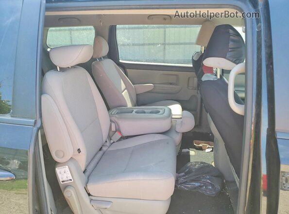 KNDMB5C15G6092095 2016 KIA SEDONA Black Rear interior view