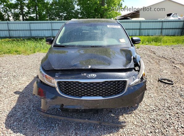 KNDMB5C15G6092095 2016 KIA SEDONA Black Front view