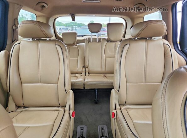 KNDMB5C15H6225892 2017 KIA SEDONA Black Rear seats view