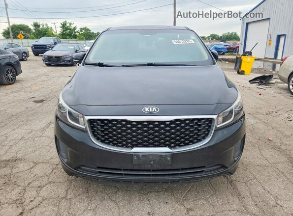 KNDMB5C15H6225892 2017 KIA SEDONA Black Front view