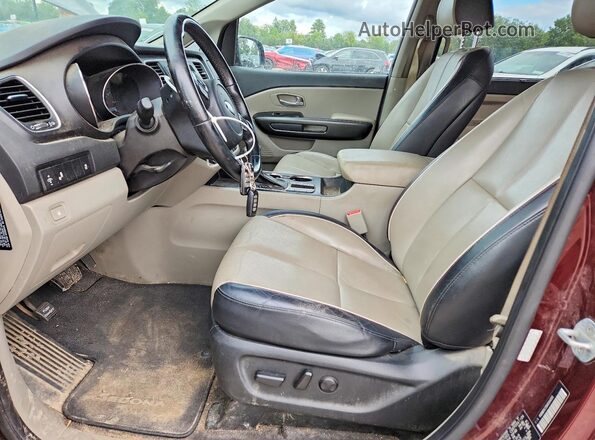 KNDMB5C15K6504105 2019 KIA SEDONA Maroon Widok wnętrza z przodu