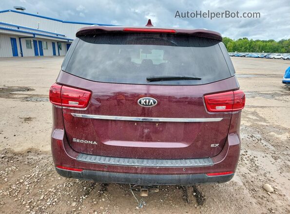 KNDMB5C15K6504105 2019 KIA SEDONA Maroon Widok z tyłu