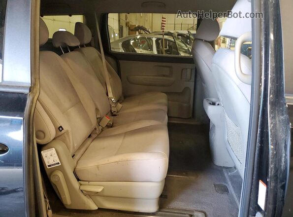 KNDMB5C16G6085933 2016 KIA SEDONA Black Rear interior view