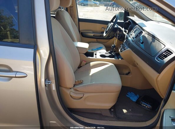KNDMB5C16G6107123 2016 KIA SEDONA Золотой Вид салона спереди