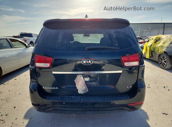 KNDMB5C16G6163546 2016 KIA SEDONA Black Widok z tyłu