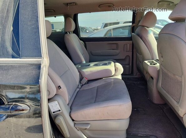 KNDMB5C16G6163546 2016 KIA SEDONA Black Widok wnętrza z tyłu