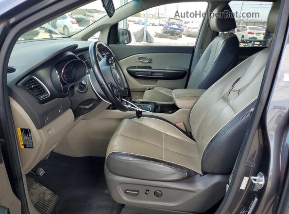 KNDMB5C16G6215662 2016 KIA SEDONA Gray Front interior view