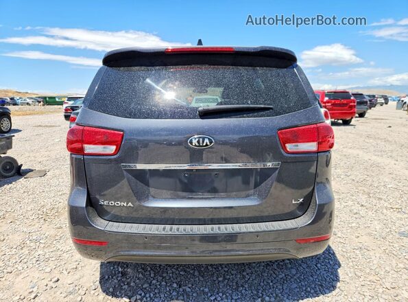 KNDMB5C16H6251269 2017 KIA SEDONA Gray Rear view
