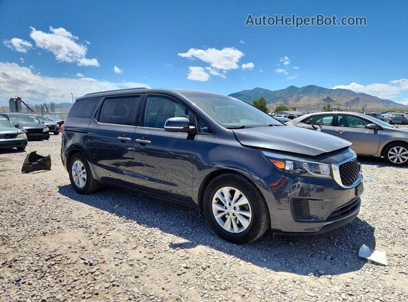 KNDMB5C16H6251269 2017 KIA SEDONA Gray Front right