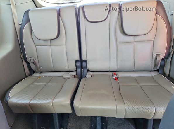 KNDMB5C16H6251269 2017 KIA SEDONA Gray Rear seats view