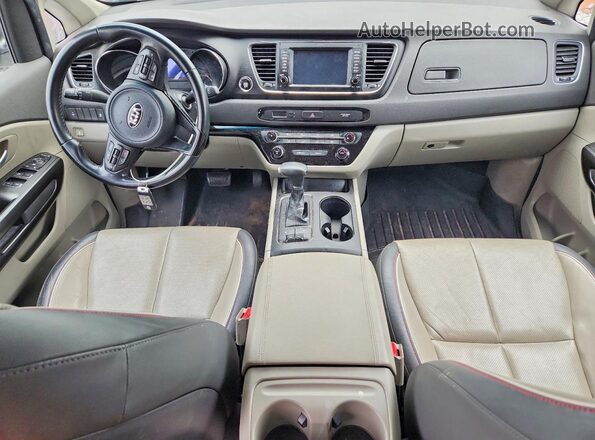 KNDMB5C16H6292842 2017 KIA SEDONA Brown Vista del salpicadero