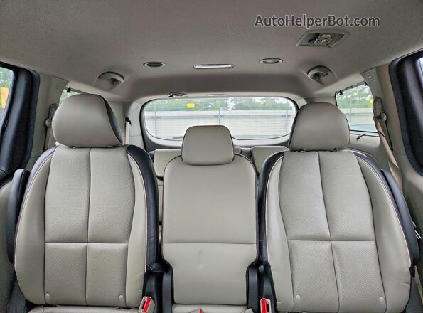 KNDMB5C16H6292842 2017 KIA SEDONA Brown Vista de los asientos traseros
