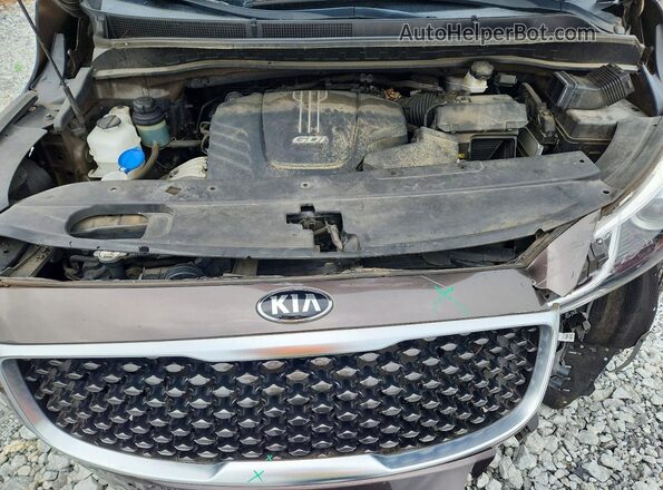 KNDMB5C16H6292842 2017 KIA SEDONA Brown Vista del compartimento del motor