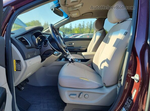 KNDMB5C17H6341353 2017 KIA SEDONA Burgundy Front interior view
