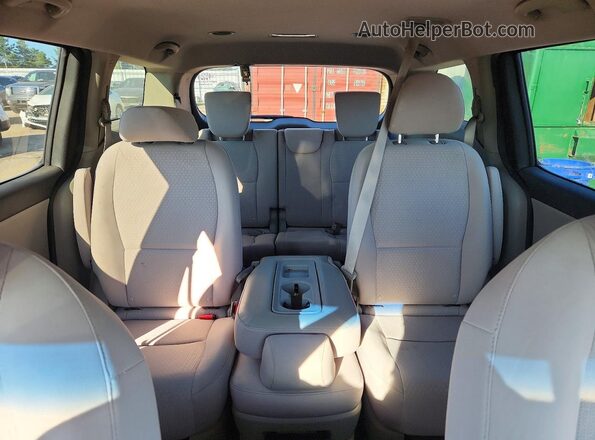 KNDMB5C17H6341353 2017 KIA SEDONA Burgundy Rear seats view