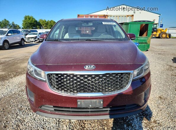 KNDMB5C17H6341353 2017 KIA SEDONA Burgundy Front view