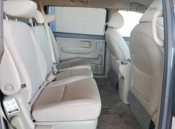 KNDMB5C18G6128023 2016 KIA SEDONA Blue Vista de los asientos traseros