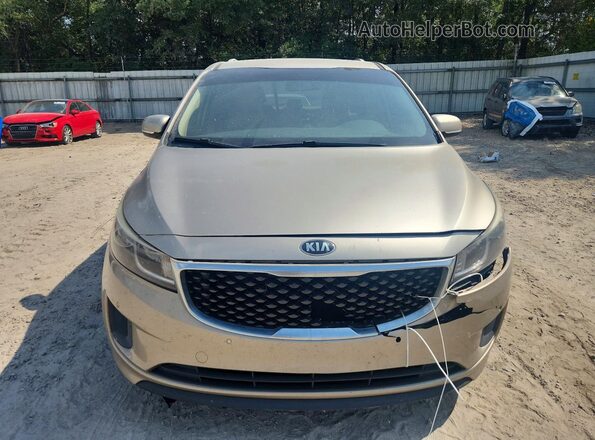 KNDMB5C18H6266842 2017 KIA SEDONA Gold Front view
