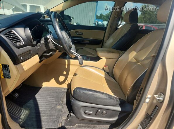 KNDMB5C18H6266842 2017 KIA SEDONA Gold Front interior view