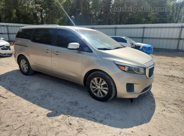 KNDMB5C18H6266842 2017 KIA SEDONA Gold Front right