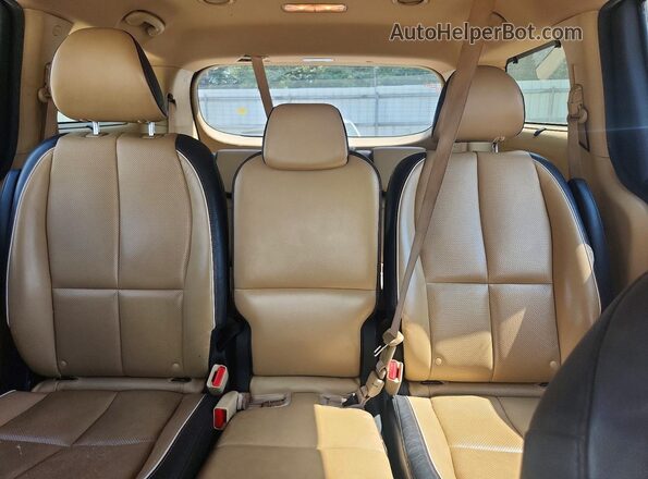 KNDMB5C18H6266842 2017 KIA SEDONA Gold Rear seats view