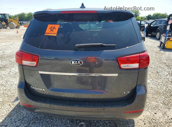 KNDMB5C18H6316025 2017 KIA SEDONA Gray Вид ззаду
