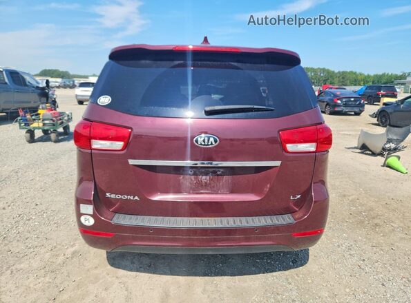 KNDMB5C18H6327588 2017 KIA SEDONA Maroon Vista trasera