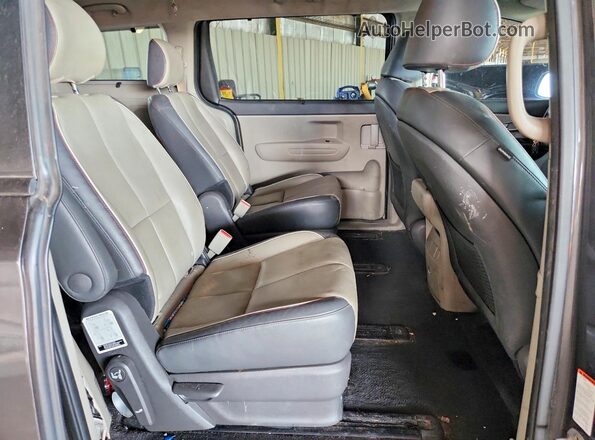 KNDMB5C18H6338350 2017 KIA SEDONA Gray Rear interior view