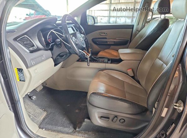 KNDMB5C18H6338350 2017 KIA SEDONA Gray Front interior view